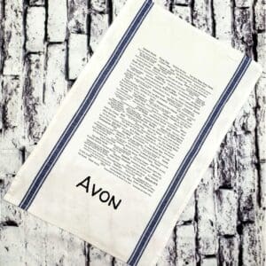 A towel with the word avon written on it.