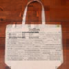 The front half of a canvas tote bag featuring fun trivia about Boston!