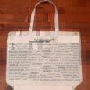 The front half of a canvas tote bag featuring fun trivia about Bridgeport!