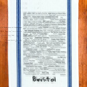 A blue striped towel with trivia about Bristol, Connecticut