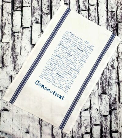 A towel that has the word connecticut written on it.