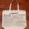 The front half of a canvas tote bag featuring fun trivia about Cambridge!