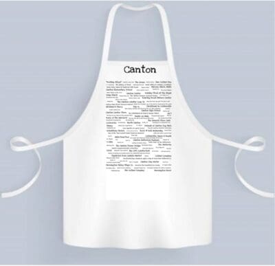 A white apron with the word " clinton " written on it.