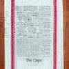 A red striped towel with trivia about Cape Cod in Massachusetts