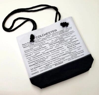 A bag with the word " colchester " written on it.