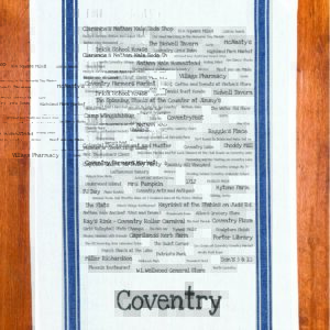 A blue striped towel with trivia about Coventry, Connecticut