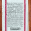 A red striped towel with trivia about Darien, Connecticut