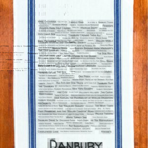A blue striped towel with trivia about Danbury, Connecticut