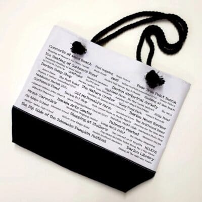 A bag with black and white writing on it.