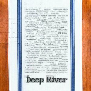 A blue striped towel with trivia about the town of Deep River, Connecticut