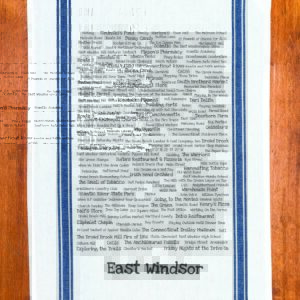 A blue striped towel with trivia about the town of East Windsor, Connecticut