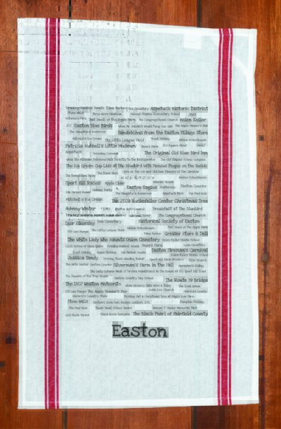 A red striped towel with trivia about the town of Easton, Connecticut