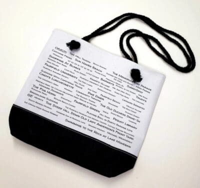 A black and white bag with words on it