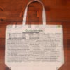 The front half of a canvas tote bag featuring fun trivia about Gloucester!
