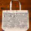 The back half of a canvas tote bag featuring fun trivia about Guilford!