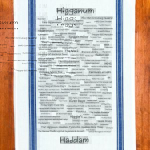 A blue striped towel with trivia about the town of Haddam, Connecticut