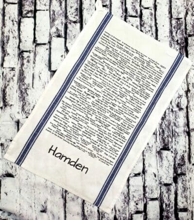 A close up of a towel with the word hamden written on it