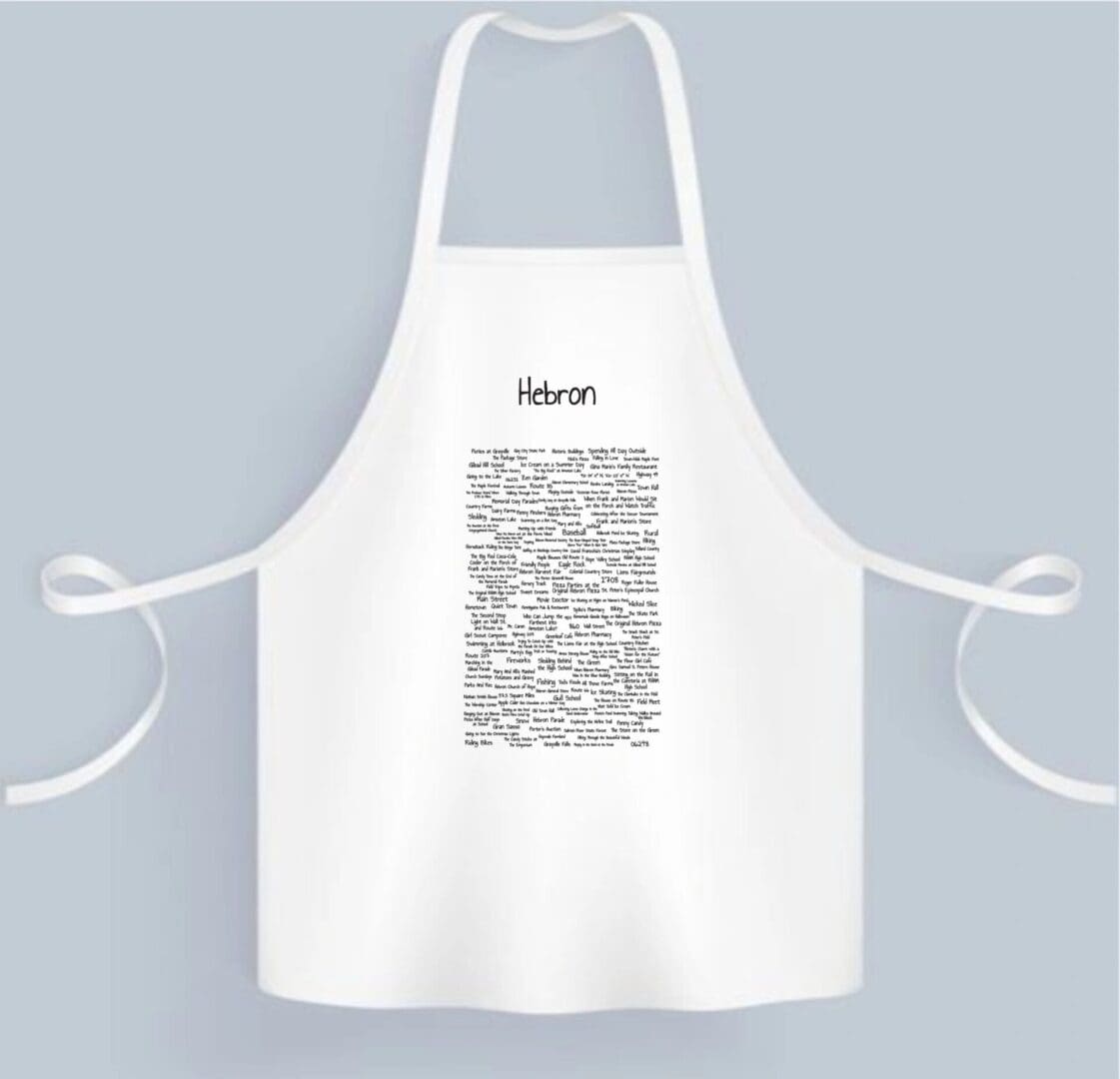 A white apron with a bunch of words written on it