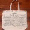 The front half of a canvas tote bag featuring fun trivia about Maine!