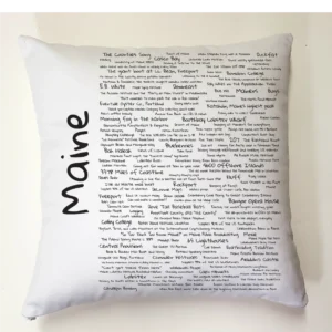 A pillow with the word maine written on it.