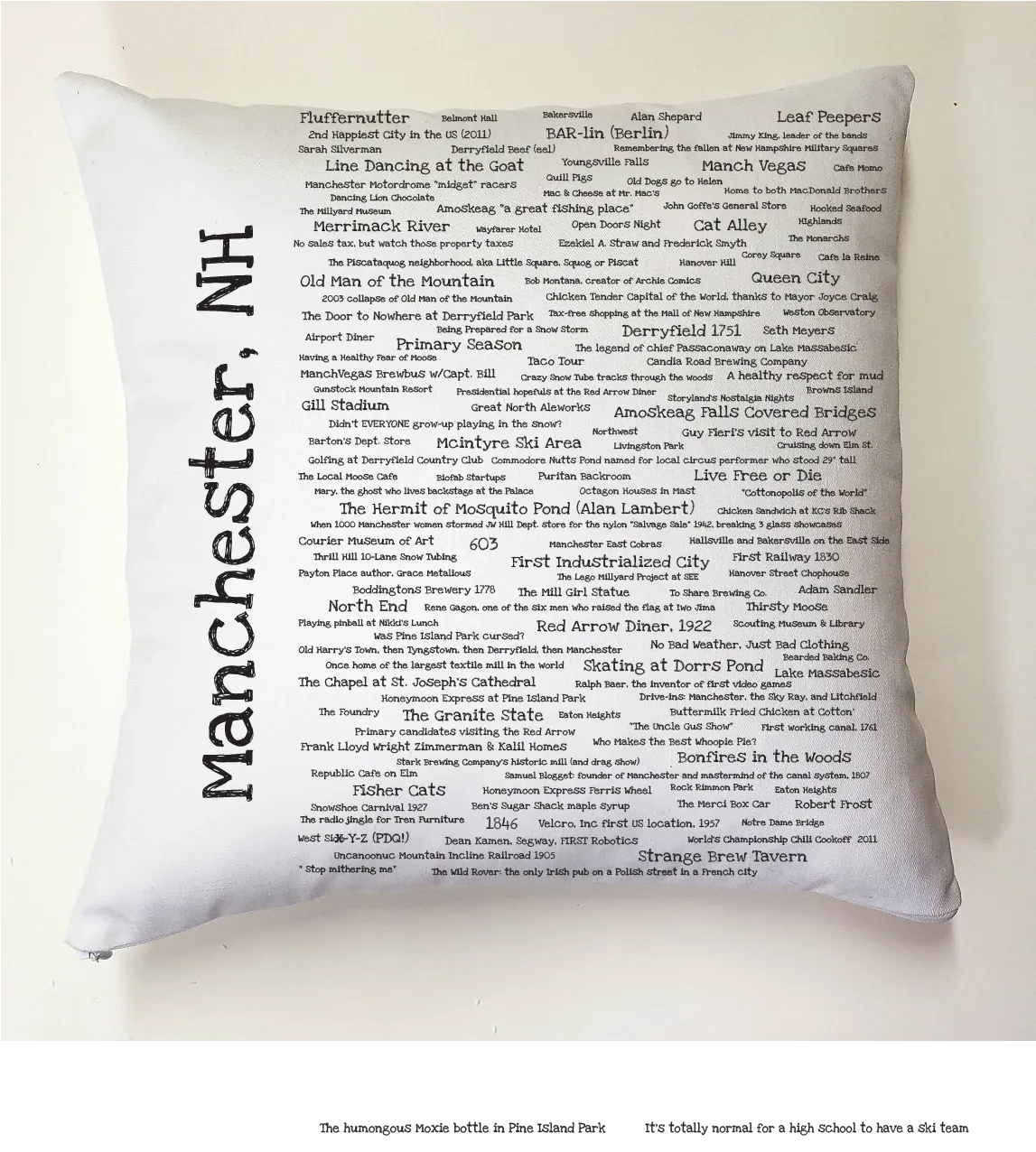 A pillow with the words manchester, nh written on it.