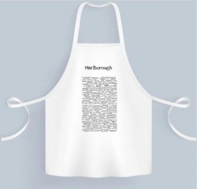 A white apron with black text on it.