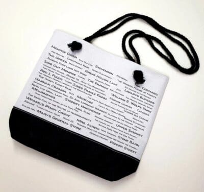 A black and white bag with words on it