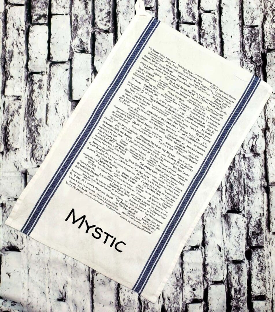 A white towel with the word mystic written on it.