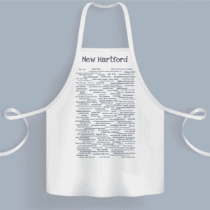 A white apron with many different words on it.