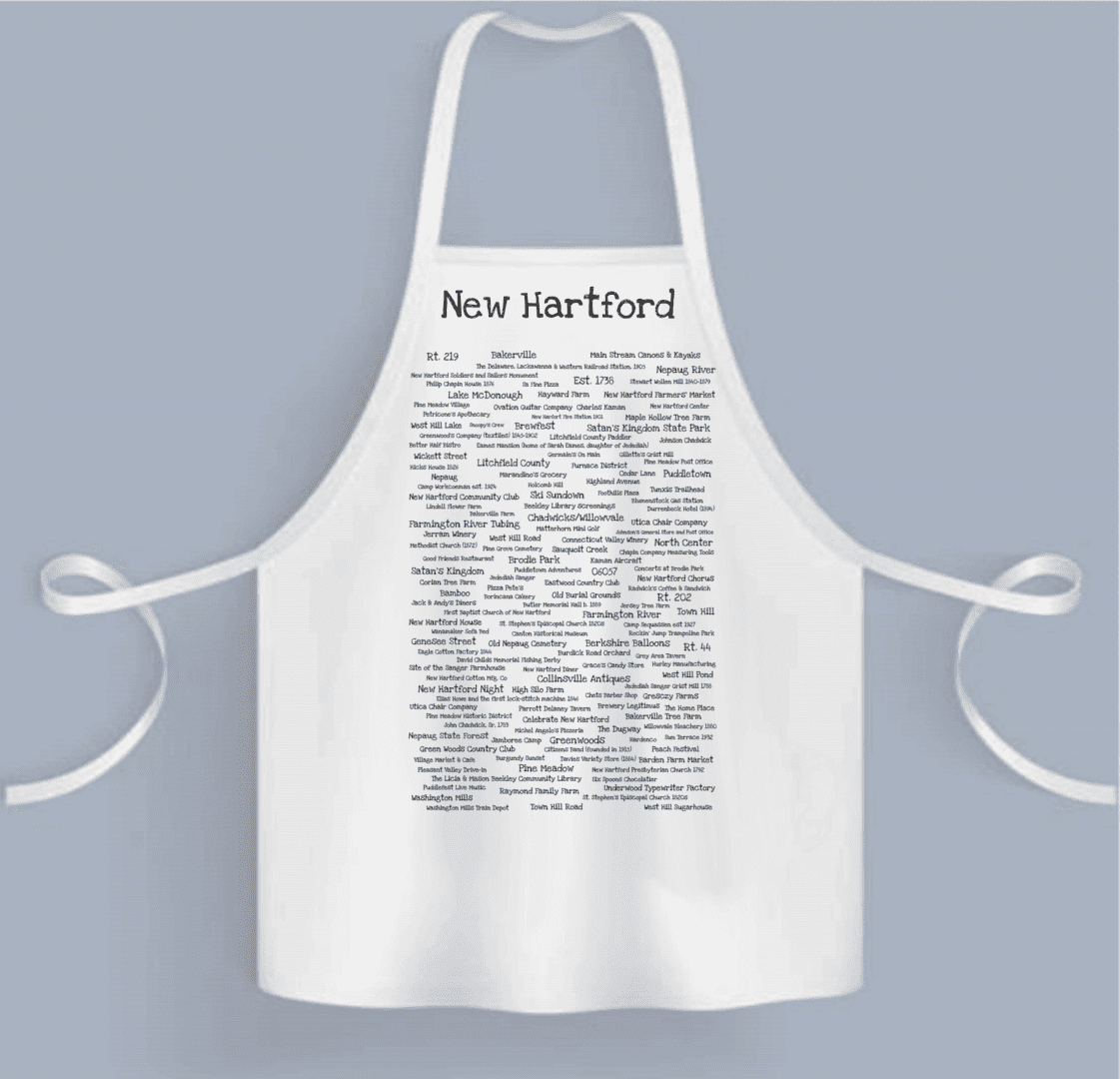 A white apron with many different words on it.