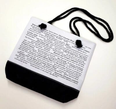 A black and white bag with a string