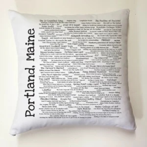 A pillow with the words portland, maine written on it.