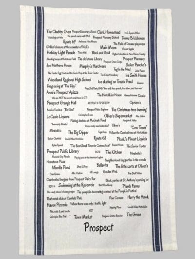 A towel with many different words written on it