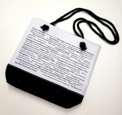 A black and white bag with a cord