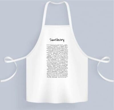 A white apron with the word " sanctuary " written on it.