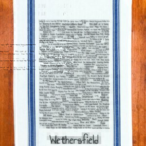 A blue striped towel with trivia about Wethersfield, Connecticut