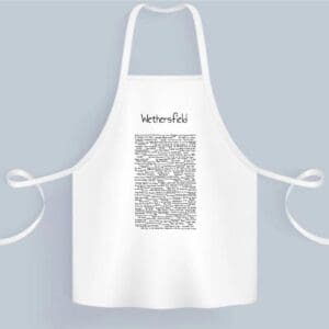 A white apron with black writing on it.