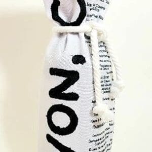 A wine bottle wrapped in newspaper with the word " onion ".