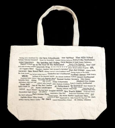 A white bag with many words written on it