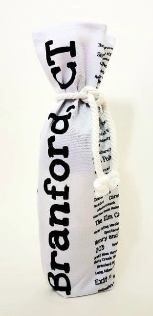 A white bottle bag with the name of sanford on it.