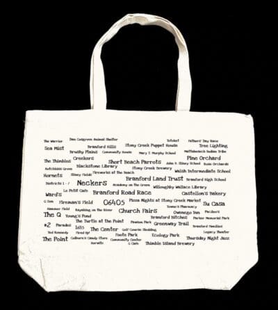 A white bag with many different words written on it