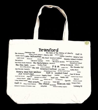 A white bag with many words written on it