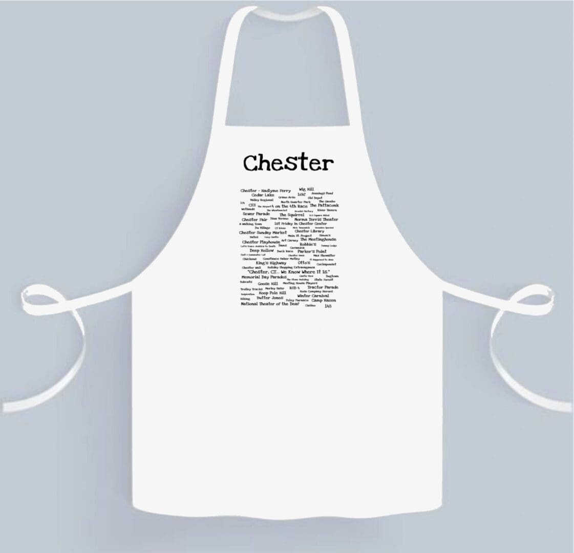 A white apron with the name cheviker written on it.