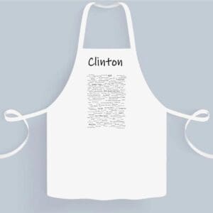 A white apron with clinton written on it.