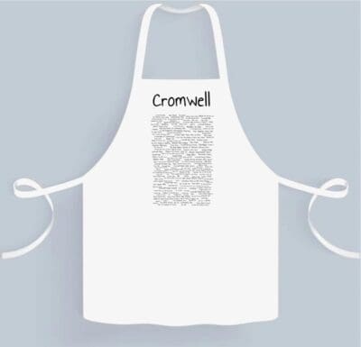 A white apron with the name crowell written in black.