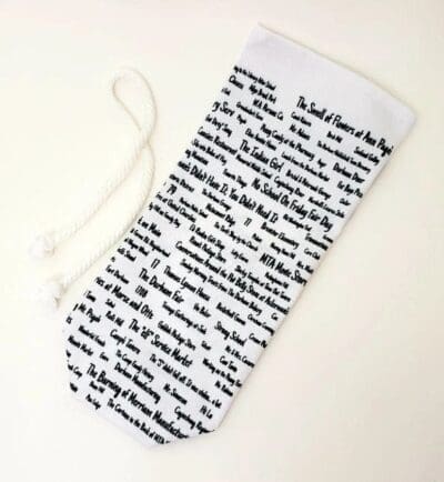 A white stocking with black writing on it.