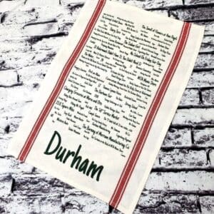 A close up of a piece of paper with the name durham written on it