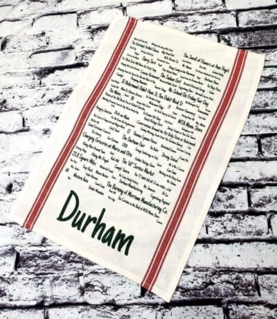 A close up of a piece of paper with the name durham written on it