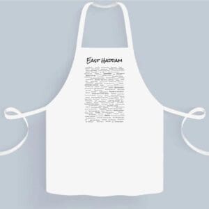 A white apron with the words " four questions ".