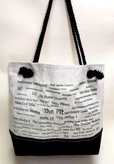 A bag with the words " the pit " written on it.